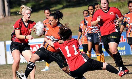 A Cherbourg forward takes on the Devils’ defence. A Cherbourg forward takes on the Devils’ defence.